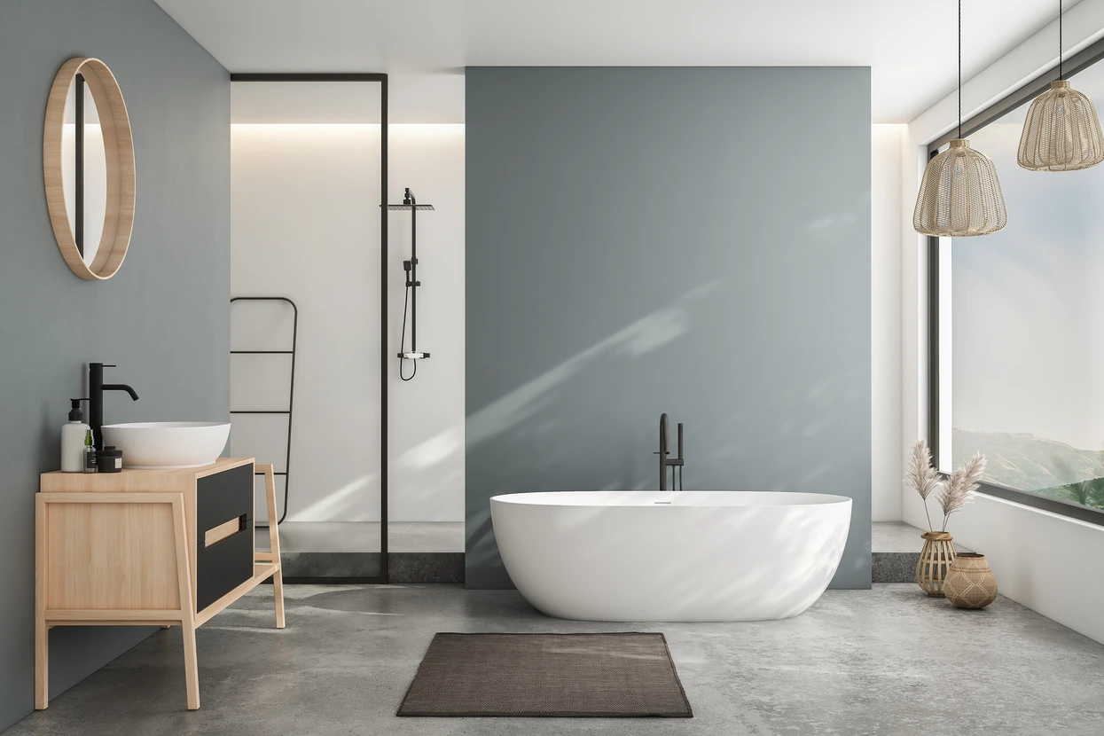 Salle de bains moderne avec baignoire encastrée, douche à l'italienne avec paroi vitrée, double vasque suspendue, WC et bidet